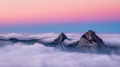 Breathtaking Mountain Peaks Above The Clouds At Sunset PC Wallpaper