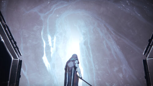 Mysterious Cloaked Warrior Standing Before a Glowing Ice Portal 4K Wallpaper