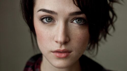 Stunning Portrait of a Young Woman with Green Eyes Desktop Wallpaper