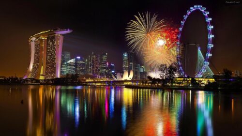 Stunning Singapore Skyline Night View with Fireworks 4K Wallpaper