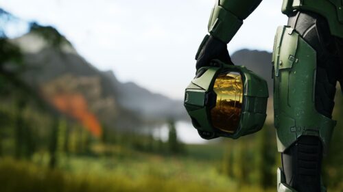 Master Chief Holding Helmet in Nature Halo Infinite Desktop Wallpaper