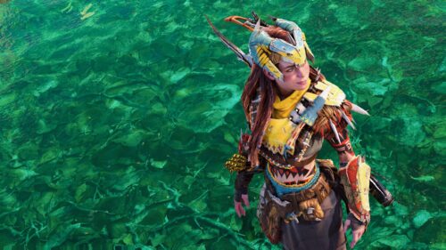 Aloy from Horizon Forbidden West Standing by Emerald Waters 4K Wallpaper