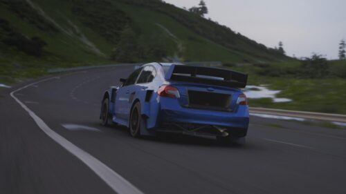 Widebody Blue Subaru WRX STI Rally Car Drifting on Mountain Road PC Wallpaper