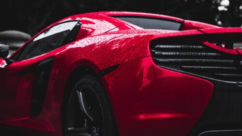 Red McLaren Sports Car Rain Drops Close Up 4K Wallpaper