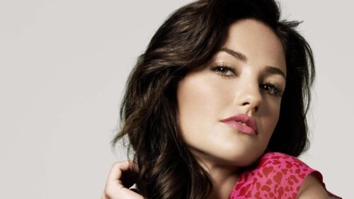 Stunning Portrait of a Beautiful Brunette Woman in Pink 4K Desktop Wallpaper