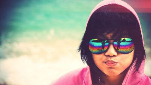 Cool Girl in Pink Hoodie with Rainbow Sunglasses Reflection PC Wallpaper