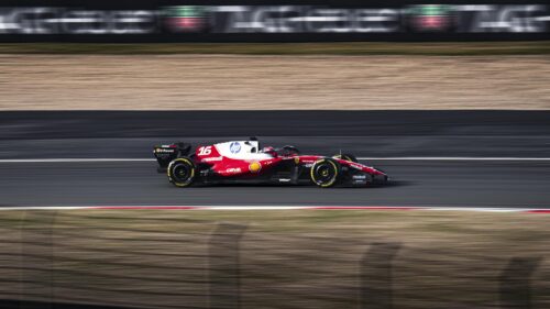 Charles Leclerc Ferrari F1 Racing Car in High Speed Motion PC Wallpaper