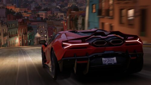 Red Lamborghini Sian Driving Through Colorful Mexican Streets PC Wallpaper