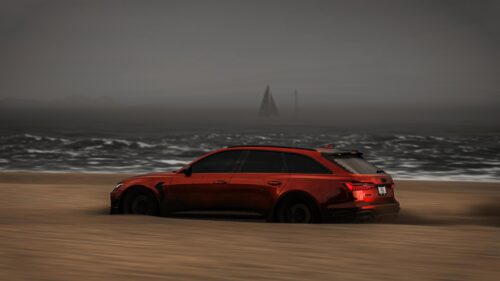 Red Audi RS6 Avant Driving on Sandy Beach at Dusk PC Wallpaper