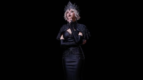 Gothic Queen in Elegant Black Dress with Crown Desktop Wallpaper