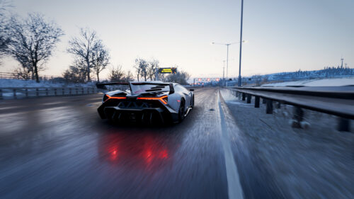 Lamborghini Essenza SCV12 Speeding on Snowy Highway Desktop Wallpaper
