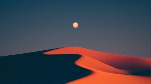 Minimalist Desert Sunset Over Orange Sand Dunes Desktop Wallpaper