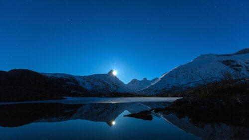 Stunning Moonlit Snow Covered Mountain Peaks at Night PC Wallpaper