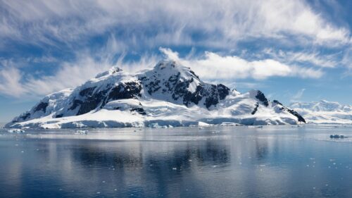 Breathtaking Snowy Mountain Peaks and Glacial Waters in Antarctica 4K Wallpaper