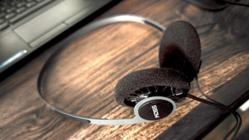 Minimalist Koss Headphones on Wooden Desk PC Wallpaper