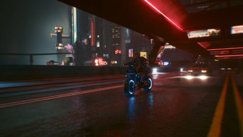 Cyberpunk 2077 Night City Biker Riding Through Neon Streets 4K Wallpaper