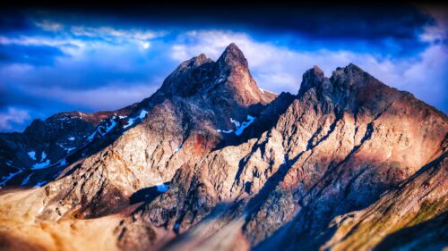 Majestic Rugged Mountain Peaks at Twilight Desktop Wallpaper