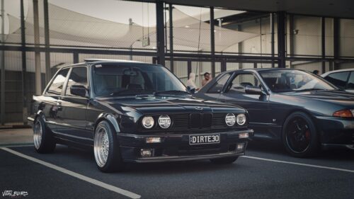 Modified BMW E30 Stance Car Parked in Urban Setting PC Wallpaper