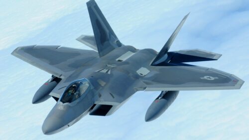 F 22 Raptor Stealth Fighter Jet Soaring Above Clouds 4K Wallpaper