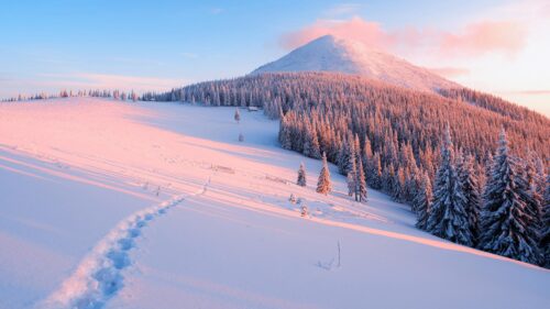 Breathtaking Snowy Mountain Peak at Sunset Winter Landscape 4K Wallpaper
