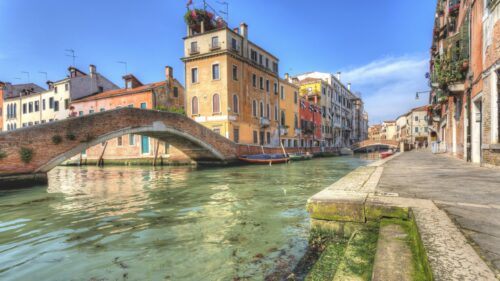 Stunning Venice Canal View with Historic Bridge and Architecture PC Wallpaper