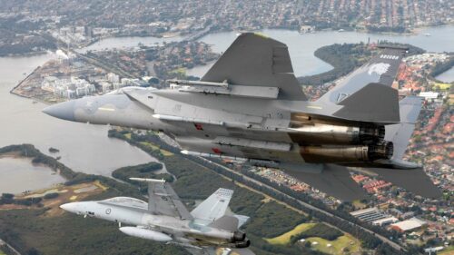 US Air Force F 15 Eagle and F 18 Hornet Fighter Jets in Flight 4K Wallpaper
