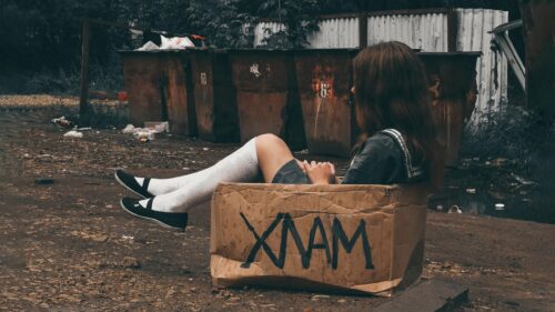Melancholic Girl Sitting in a Cardboard Box Urban Concept PC Wallpaper