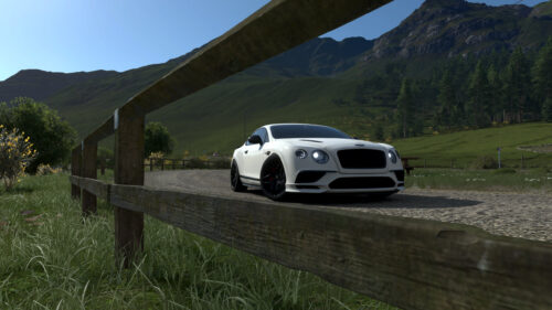 White Bentley Continental GT Sports Car on Mountain Road PC Wallpaper