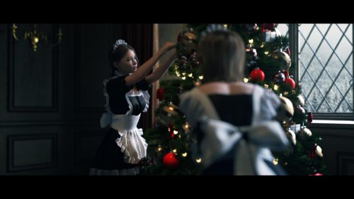 Charming Maids Decorating a Christmas Tree 4K Desktop Wallpaper