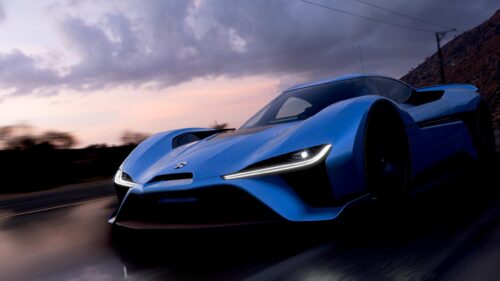 Nio EP9 Electric Hypercar Speeding on Coastal Road 4K Wallpaper