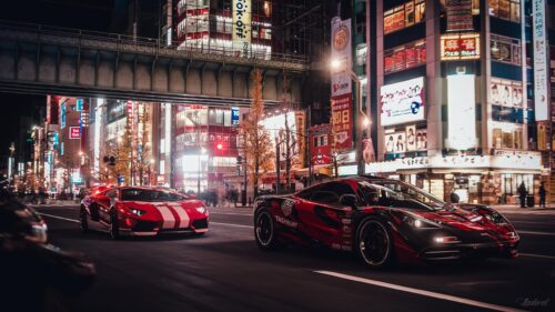 Supercars Racing Through Neon Tokyo Streets 4K Wallpaper