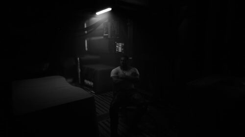 Cinematic Man Sitting in Dark Sci-Fi Room 4K Wallpaper