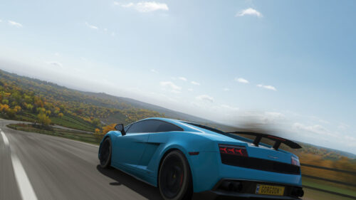 Blue Lamborghini Gallardo Driving on Scenic Countryside Road 4K Wallpaper