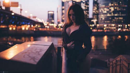 Beautiful Woman Standing by City Skyline at Night PC Wallpaper