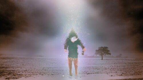 Surreal Person Dissolving into Light in a Winter Field Desktop Wallpaper