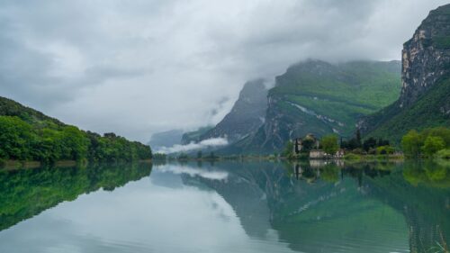 Misty Alpine Lake and Ancient Architecture 4K PC Wallpaper
