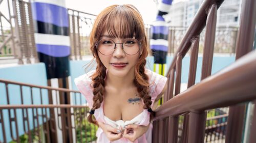 Cute Asian Girl with Braided Hair and Glasses Desktop Wallpaper