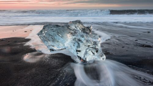Stunning Crystal Ice Chunk on Icelandic Black Sand Beach PC Wallpaper