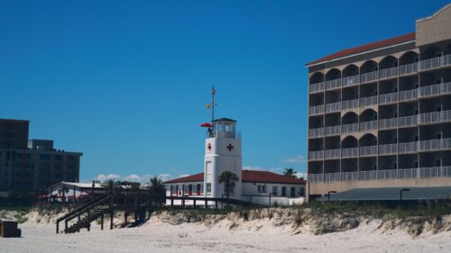 Sunny Florida Beachside Lifeguard Station and Resort Hotel 4K Wallpaper