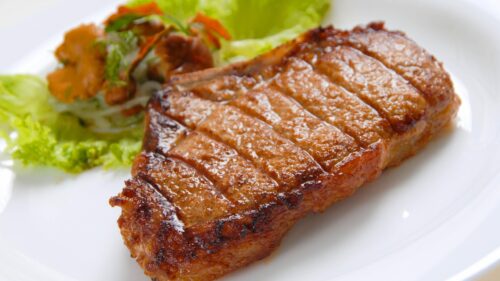 Delicious Grilled Beef Steak with Fresh Salad Garnished PC Wallpaper