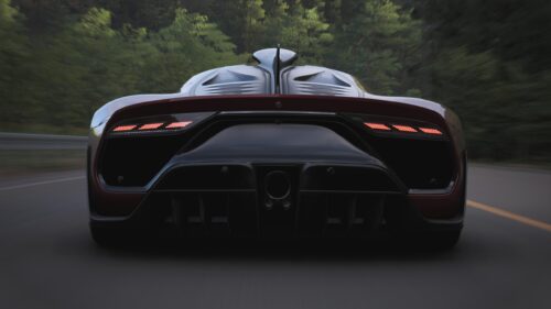 Stunning Zenvo TSR S Rear View Driving on Forest Road PC Wallpaper