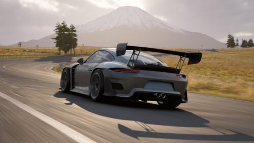 Porsche 911 GT2 RS Racing on Scenic Mountain Road PC Wallpaper
