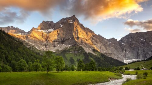 Stunning Alps Mountain Peak at Sunset Golden Hour Desktop Wallpaper