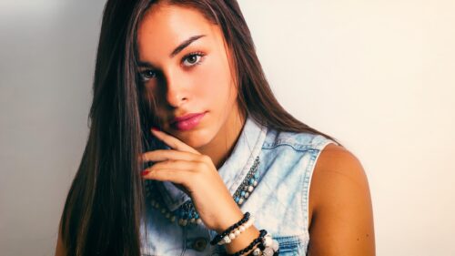 Beautiful Young Woman Portrait With Denim Vest Desktop Wallpaper