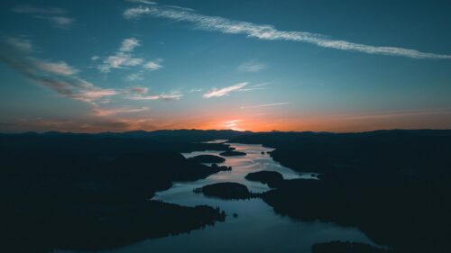 Stunning Aerial Sunset Over Mountain Lake Landscape PC Wallpaper