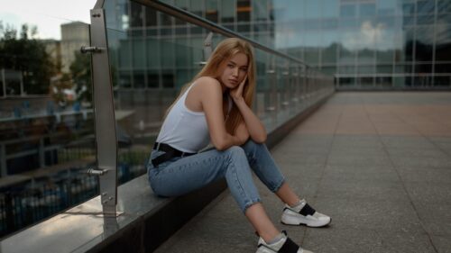 Stunning Blonde Model Posing in Casual Urban Style PC Wallpaper