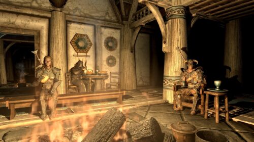 Elder Scrolls Skyrim Tavern Interior with Warriors PC Wallpaper
