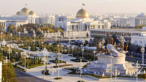 Ashgabat Cityscape with Iconic Horse Fountain and Golden Domes Desktop Wallpaper