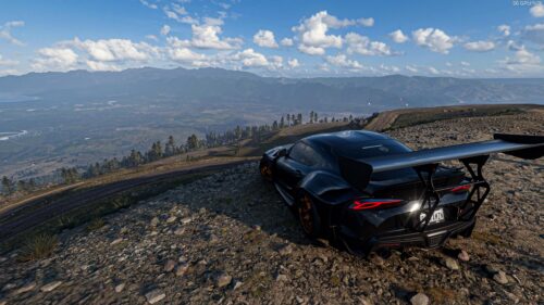 Modified Black Toyota Supra on Mountain Ridge Desktop Wallpaper