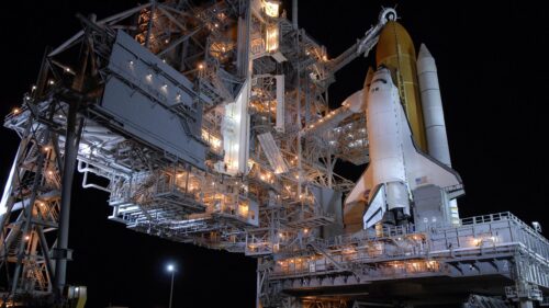 NASA Space Shuttle on Launch Pad at Night 4K Wallpaper